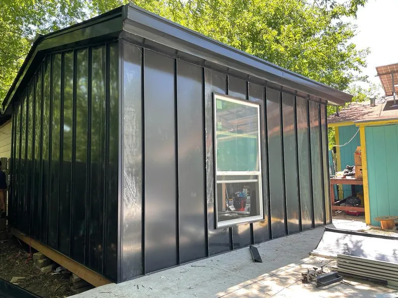 Black standing seam metal wall panels for Roof Inspection in Goose Creek